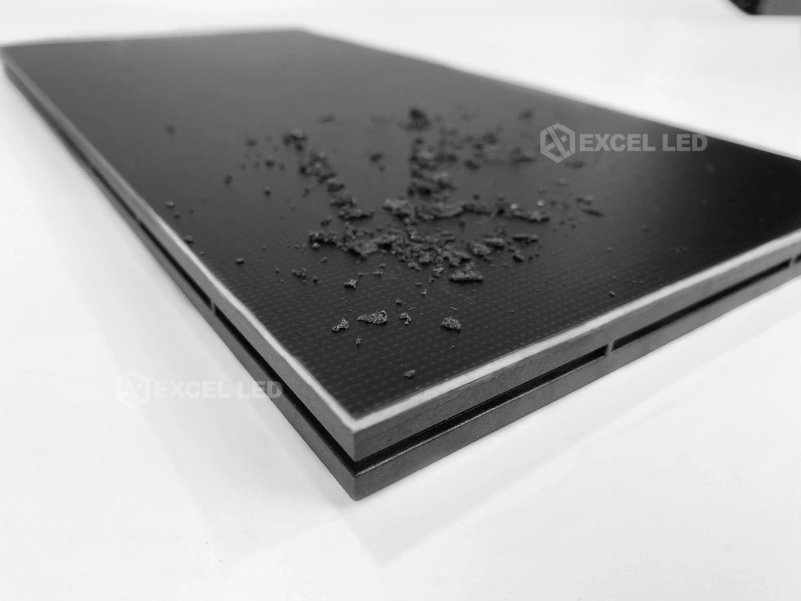 Close-up of a sealed COB LED module surface resisting debris, demonstrating the 4H hardness protected front of COB displays