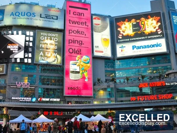 P2.976 rental LED display outdoor wall in a public plaza showing bright content in daylight