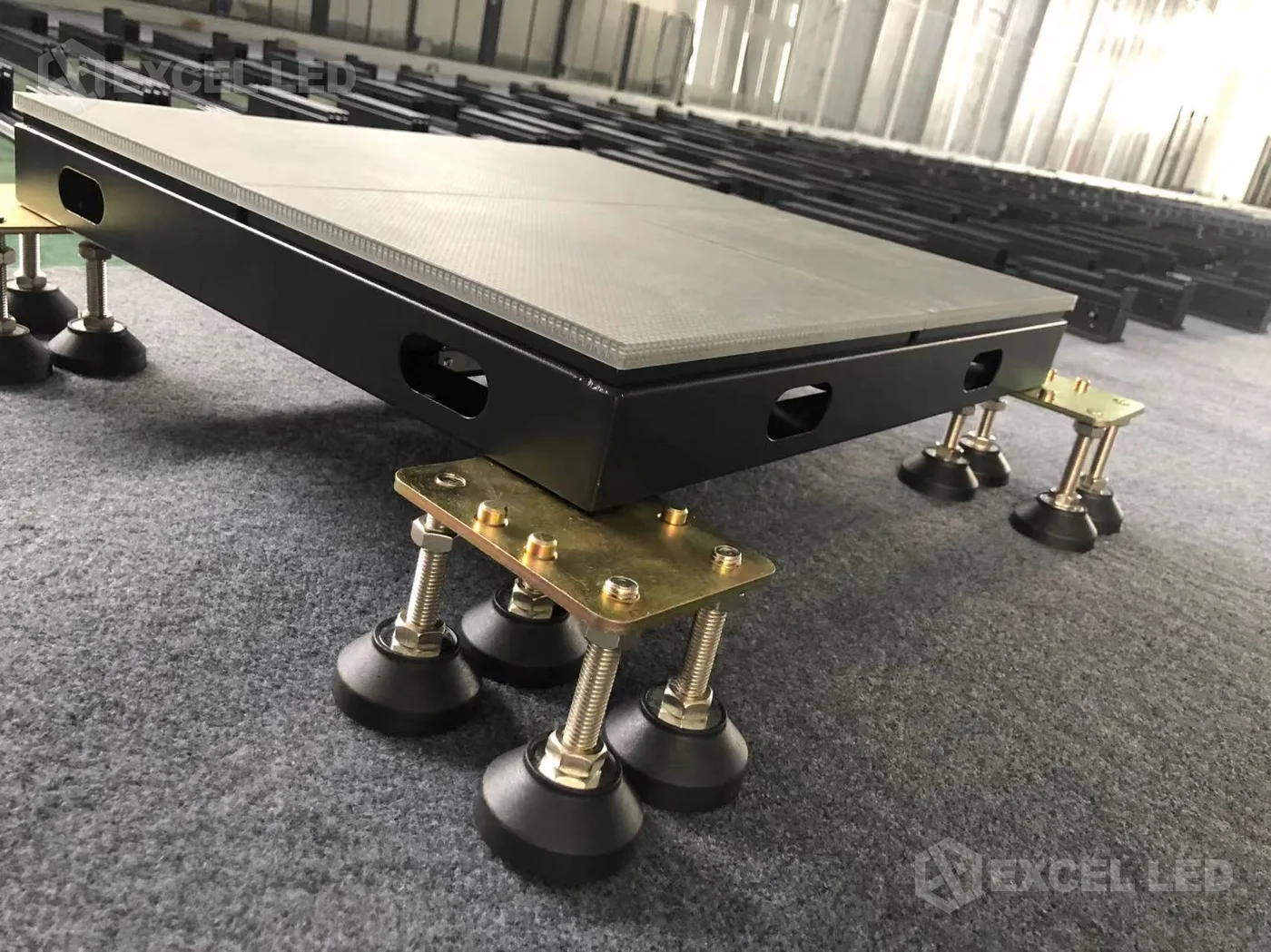 Interactive LED floor screen cabinet with adjustable leveling feet for floor-flush installation